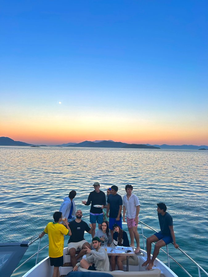 The Terac team on a boat at sunset in Rio de Janeiro